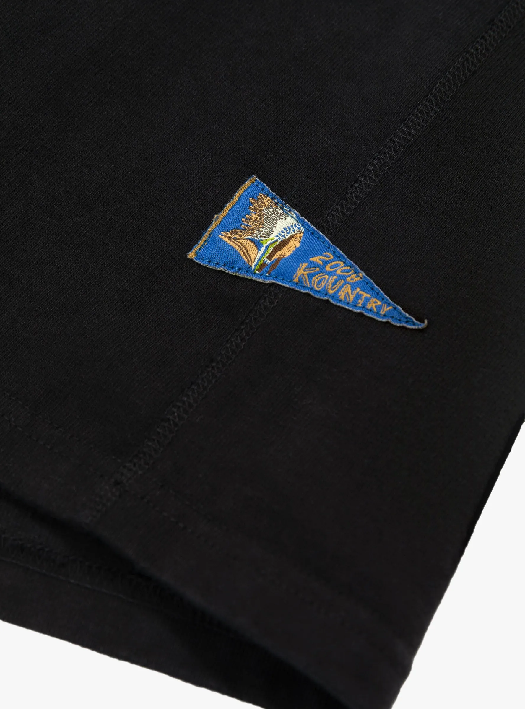 Dense Jersey Butterfly Concho Pocket Tee Black