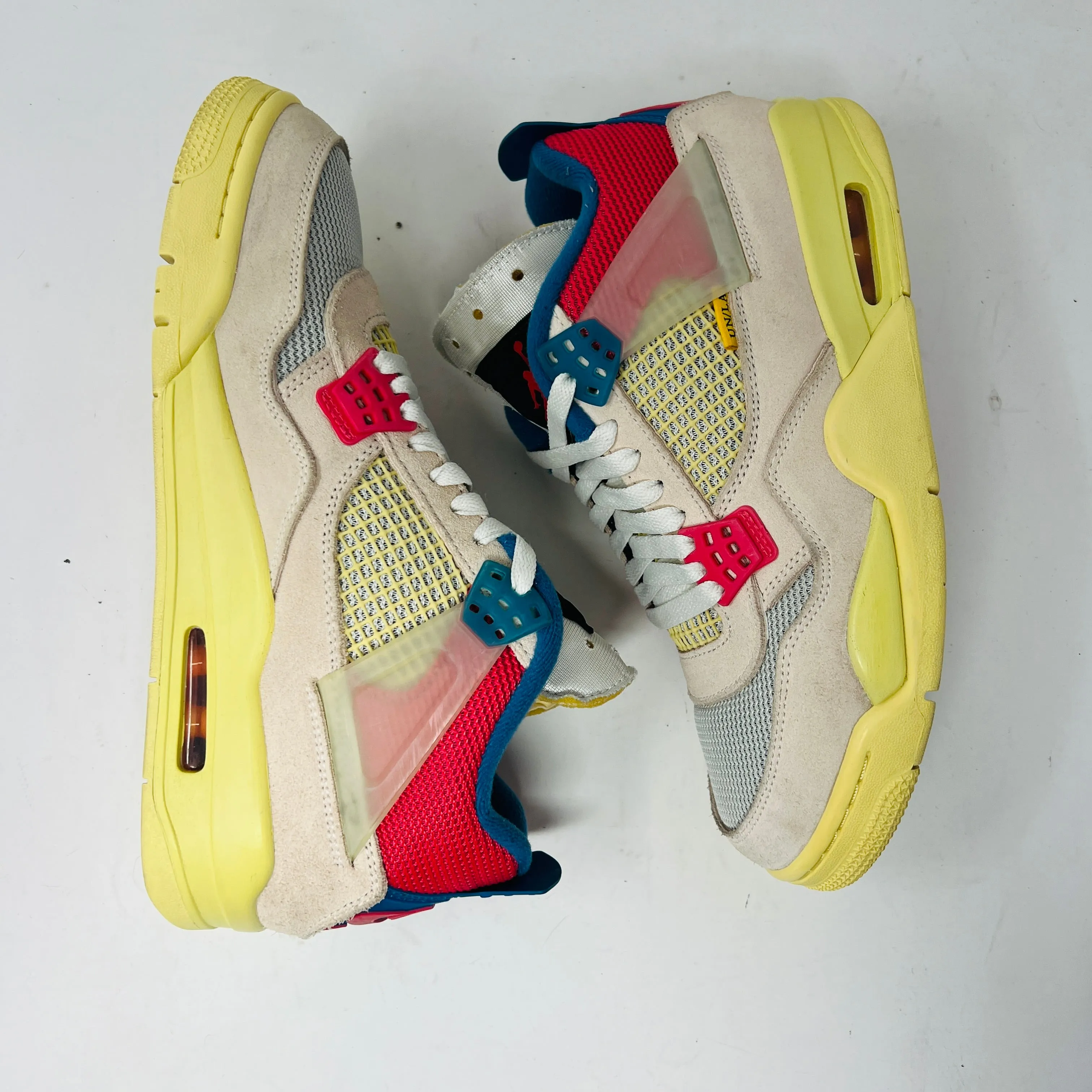 Jordan 4 Retro Union Guava Ice